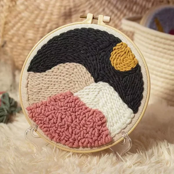 Midnight mountains punch needle coasters kit with colorful mountains design in embroidery hoop and complete crafting supplies