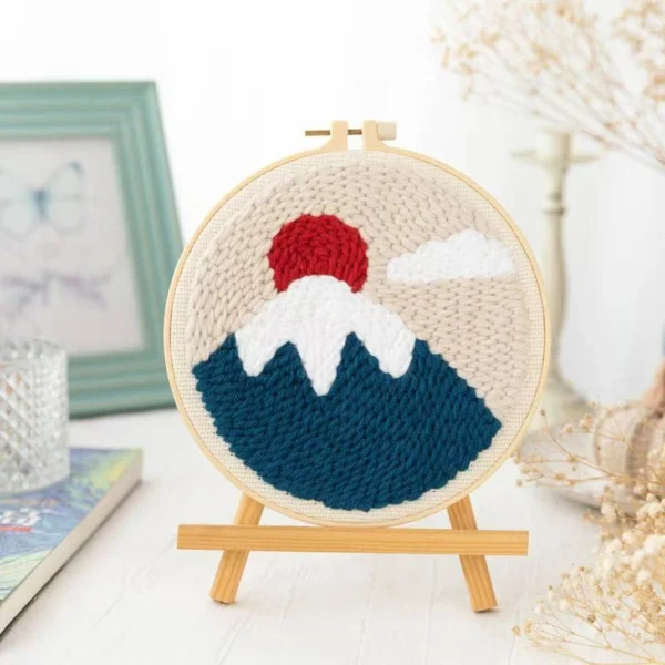 Mount Fuji art punch needle kit showing Japanese mountain embroidery design in wooden hoop with crafting