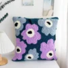 Purple Flowers Punch Needle Pillow Kit Purple flowers punch needle pillow kit showing finished cushion with floral design and crafting materials
