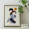 Punch needle hug art design featuring two figures embracing, framed as warm DIY wall decor or a sentimental handmade gift