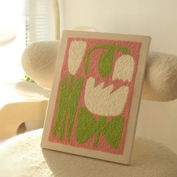 Punch needle wall art kit with pink and white flowers on canvas, perfect for DIY home decor