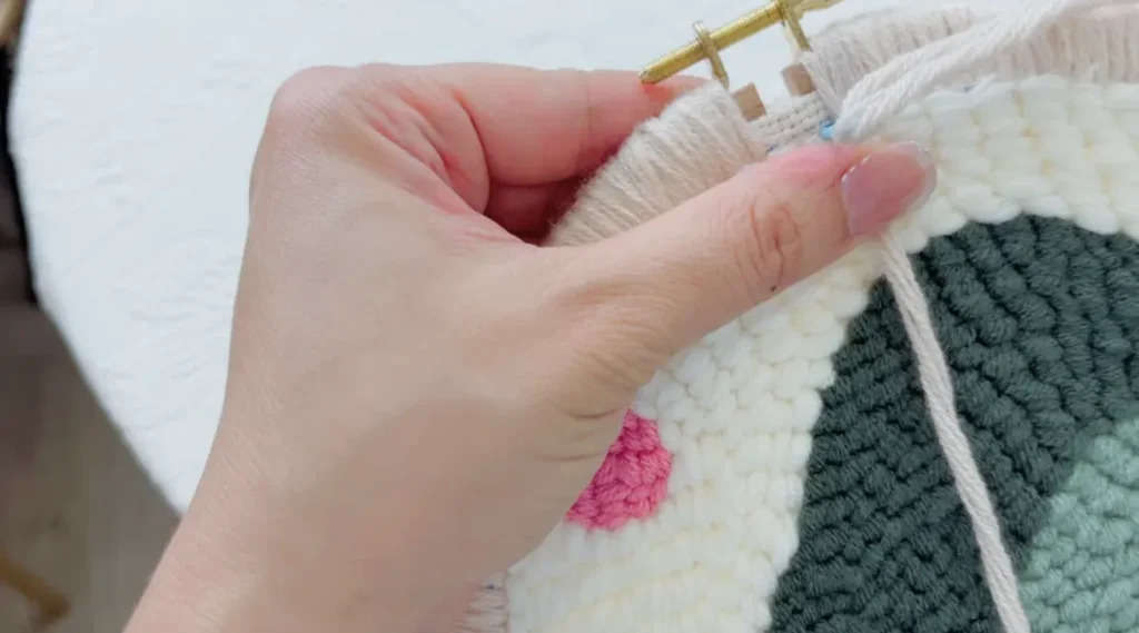 Wrapping exposed hoop at the screw area using the same stitching method.